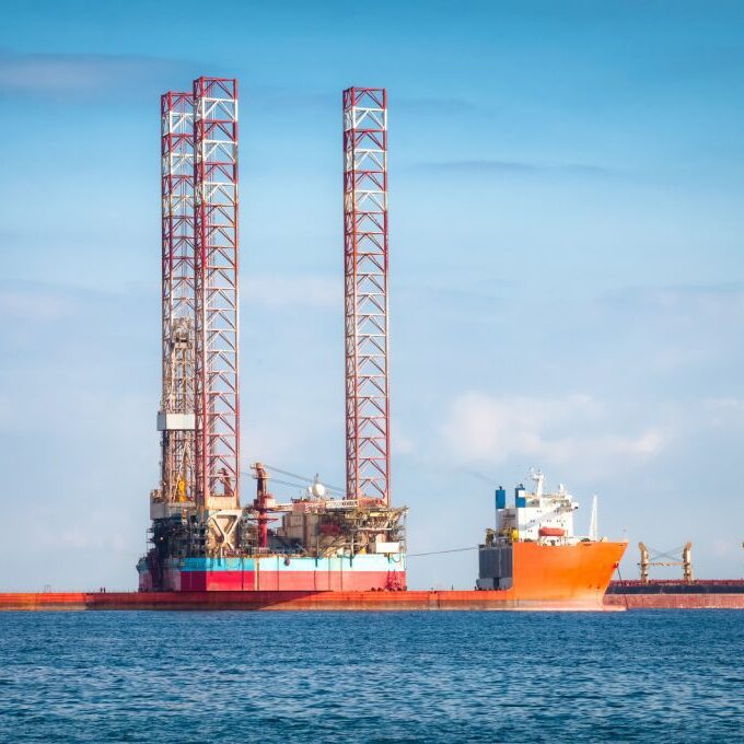 An oil rig in the ocean.